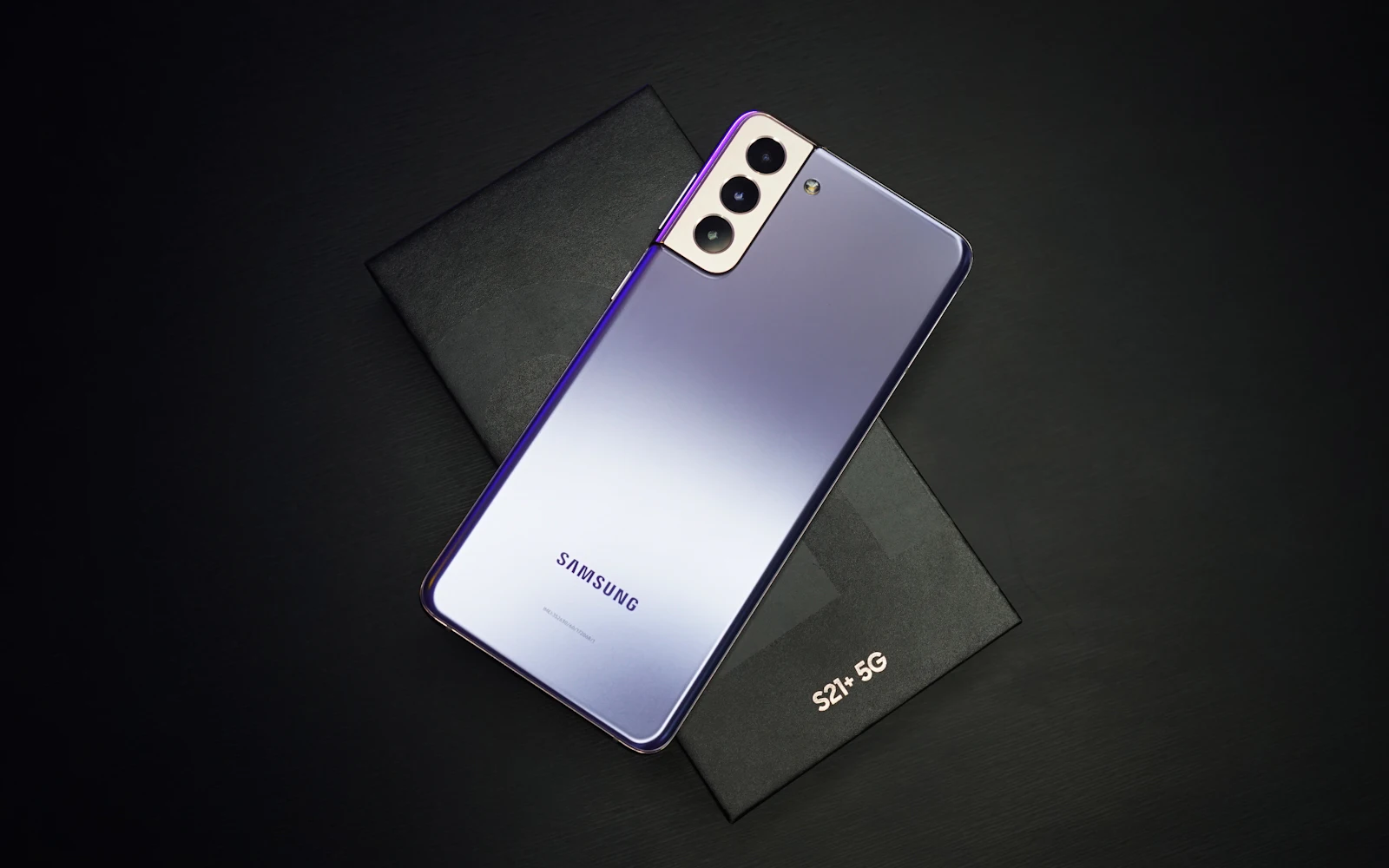 Samsung Galaxy smartphone lying on a dark surface
