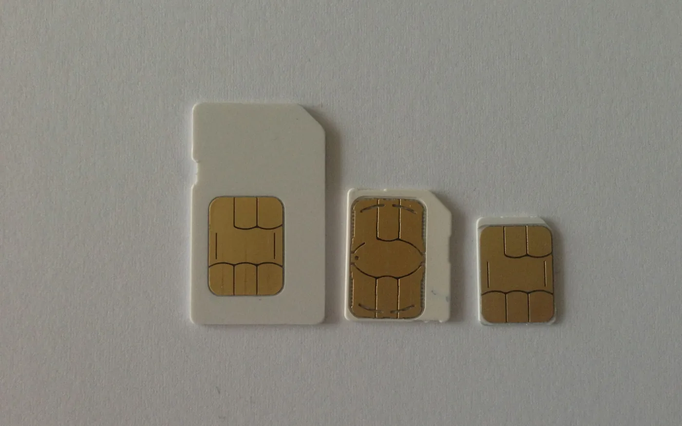 Mini, micro and nano SIM cards side by side