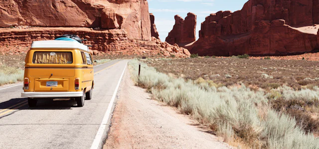 Camper van on a desert road trip